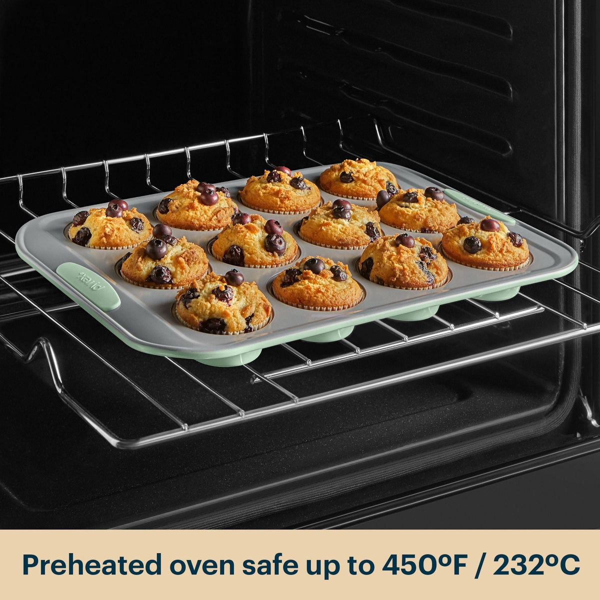Silicone muffin tray with baked muffins in an oven, preheated up to 450°F/232°C.