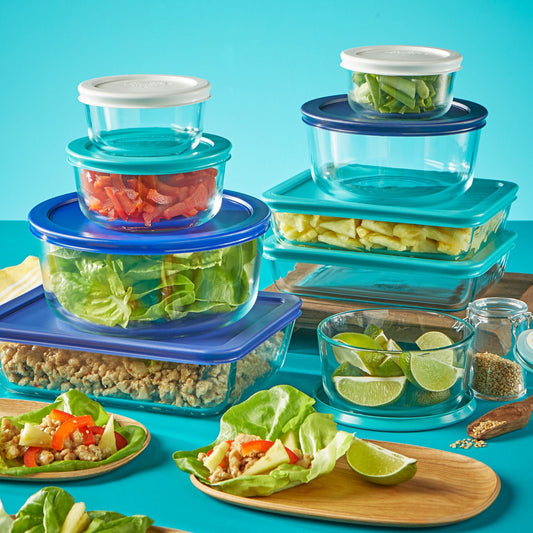 Simply Store® 18-piece Glass Storage Set on table with food in most containers