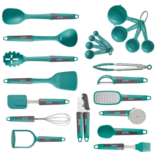 Collection of teal kitchen utensils and measuring tools on a white background