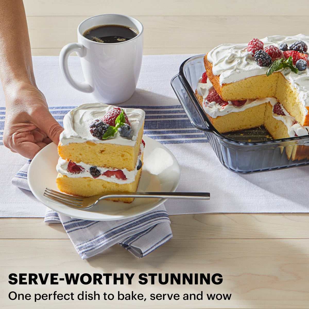 Pyrex bakeware with colorful cake and coffee on a wooden table with text