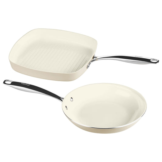 Cream-colored frying pan with a lid on a white background
